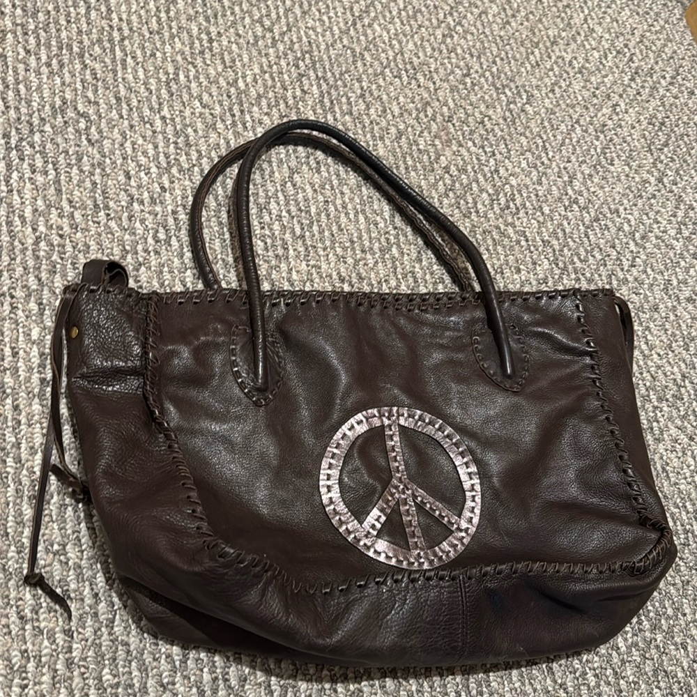 Carla Mancini brown leather peace sign tote